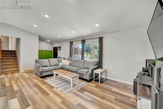 6465 Pawnee Cir, Colorado Springs, CO 80915 - living area with light wood finished floors, stairs, recessed lighting, baseboards, and visible vents