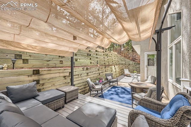 7465 Winding Oaks Dr, Colorado Springs, CO 80919 - view of patio featuring an outdoor hangout area