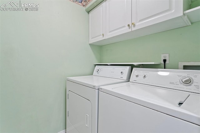 6675 Cabin Creek Dr, Colorado Springs, CO 80923 - laundry room featuring cabinet space and washer and clothes dryer