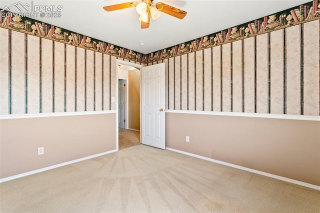 6675 Cabin Creek Dr, Colorado Springs, CO 80923 - carpeted spare room with baseboards and a ceiling fan
