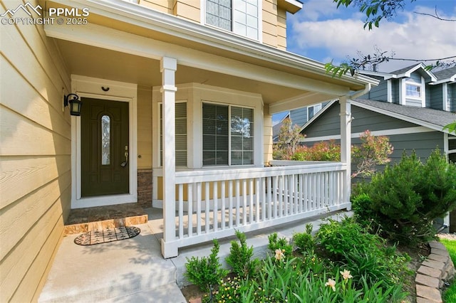 6675 Cabin Creek Dr, Colorado Springs, CO 80923 - view of exterior entry featuring a porch