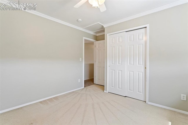 6675 Cabin Creek Dr, Colorado Springs, CO 80923 - unfurnished bedroom featuring carpet floors, baseboards, ornamental molding, a closet, and a ceiling fan