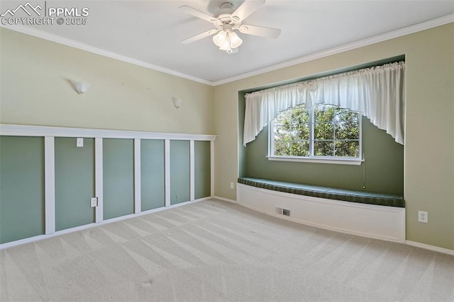 6675 Cabin Creek Dr, Colorado Springs, CO 80923 - empty room featuring crown molding, ceiling fan, light carpet, and baseboards