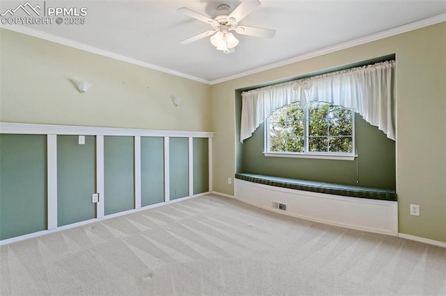 6675 Cabin Creek Dr, Colorado Springs, CO 80923 - unfurnished room with ornamental molding, a ceiling fan, light carpet, and baseboards