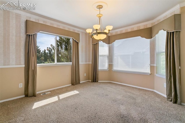6675 Cabin Creek Dr, Colorado Springs, CO 80923 - carpeted spare room with a chandelier, plenty of natural light, crown molding, and baseboards