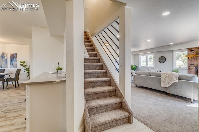 1120 Lake Woodmoor Dr, Monument, CO 80132 - stairs with recessed lighting and wood finished floors
