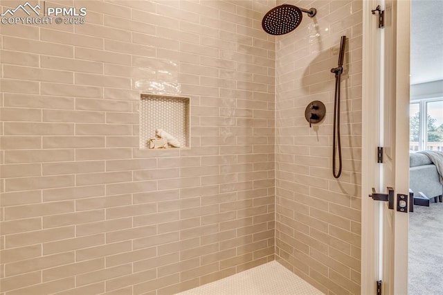 1120 Lake Woodmoor Dr, Monument, CO 80132 - ensuite bathroom featuring a tile shower and ensuite bathroom