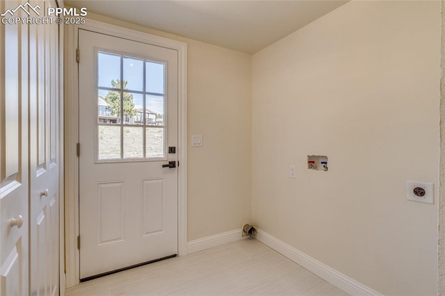 1120 Lake Woodmoor Dr, Monument, CO 80132 - clothes washing area with laundry area, washer hookup, baseboards, and hookup for an electric dryer