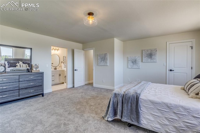 1120 Lake Woodmoor Dr, Monument, CO 80132 - bedroom featuring carpet flooring, ensuite bathroom, and baseboards