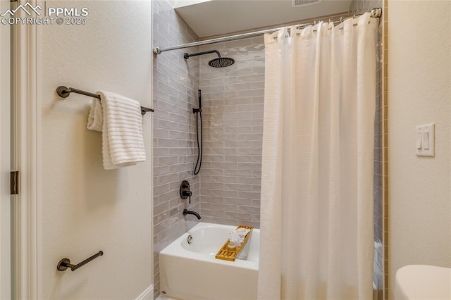 1120 Lake Woodmoor Dr, Monument, CO 80132 - bathroom with shower / bath combination with curtain and toilet