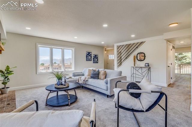 1120 Lake Woodmoor Dr, Monument, CO 80132 - living room featuring recessed lighting, baseboards, and stairs