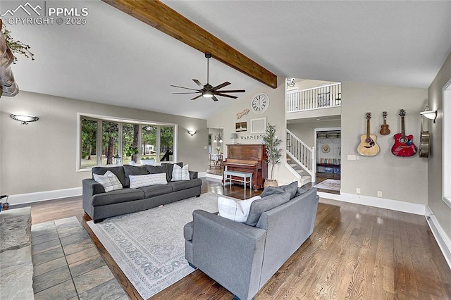 17350 Goshawk Rd, Colorado Springs, CO 80908 - living room featuring wood finished floors, beam ceiling, baseboards, ceiling fan, and high vaulted ceiling