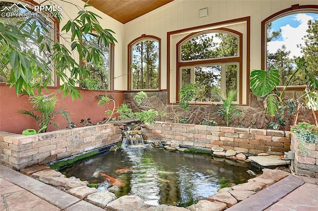 17350 Goshawk Rd, Colorado Springs, CO 80908 - details featuring a garden pond