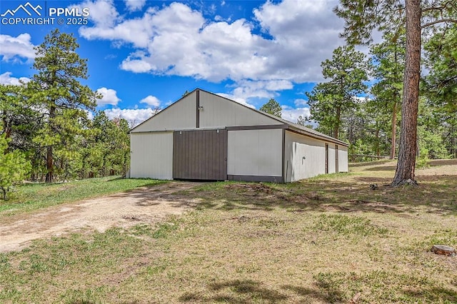 17350 Goshawk Rd, Colorado Springs, CO 80908 - view of pole building featuring a lawn