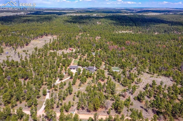 17350 Goshawk Rd, Colorado Springs, CO 80908 - drone / aerial view featuring a wooded view