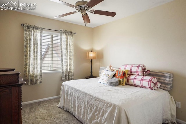 bedroom with carpet floors, baseboards, and a ceiling fan