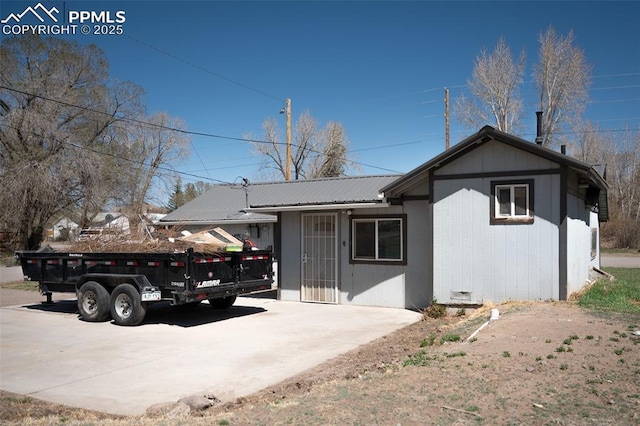 1015 5th St, Del Norte, CO 81132 - view of front of house featuring metal roof