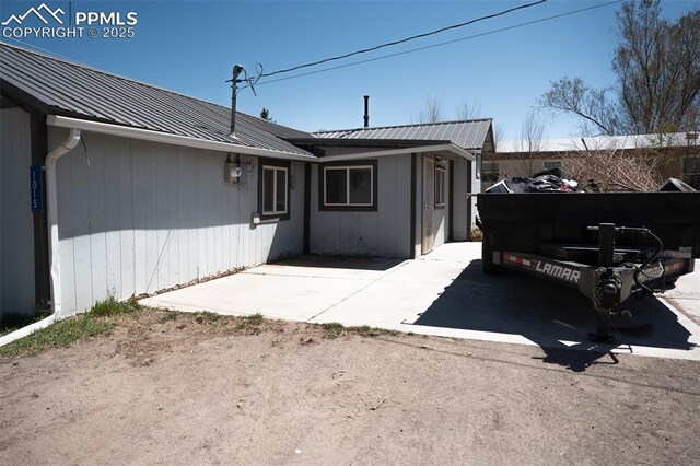 1015 5th St, Del Norte, CO 81132 - back of property featuring a standing seam roof and metal roof