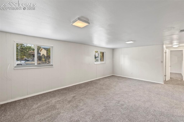 621 Rowe Ln, Colorado Springs, CO 80911 - carpeted empty room with baseboards and visible vents