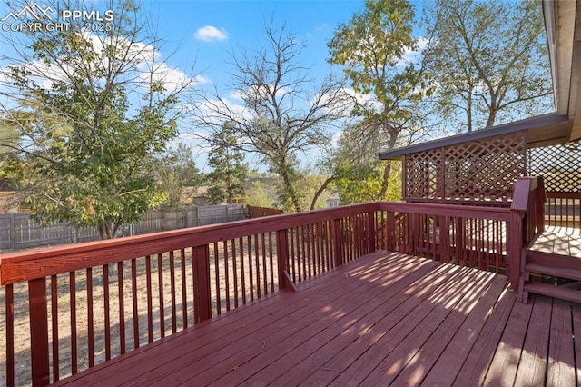621 Rowe Ln, Colorado Springs, CO 80911 - wooden deck featuring a fenced backyard
