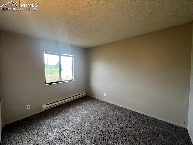 1154 Darby St, Colorado Springs, CO 80907 - unfurnished room featuring a baseboard heating unit, dark colored carpet, a textured ceiling, and baseboards
