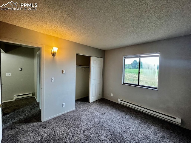 1154 Darby St, Colorado Springs, CO 80907 - unfurnished bedroom with a baseboard radiator, carpet floors, a closet, a textured ceiling, and baseboards