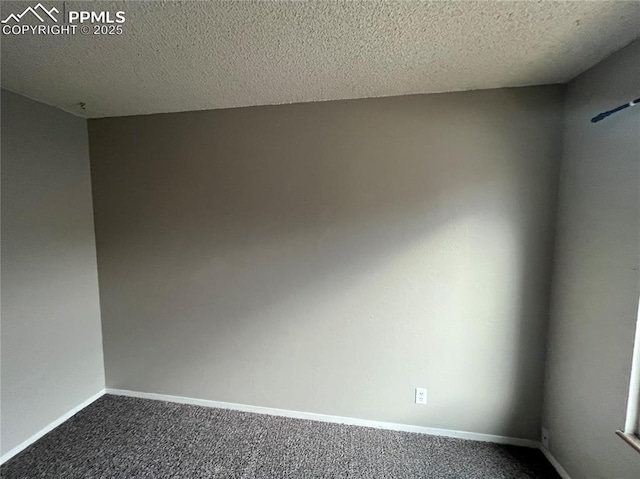 1154 Darby St, Colorado Springs, CO 80907 - empty room featuring dark carpet, a textured ceiling, and baseboards