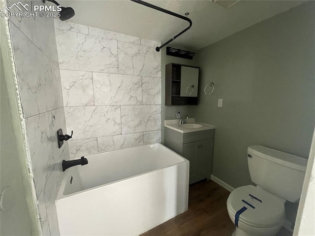 1426 Territory Trl, Colorado Springs, CO 80919 - bathroom with vanity, toilet, shower / bath combination, wood finished floors, and baseboards