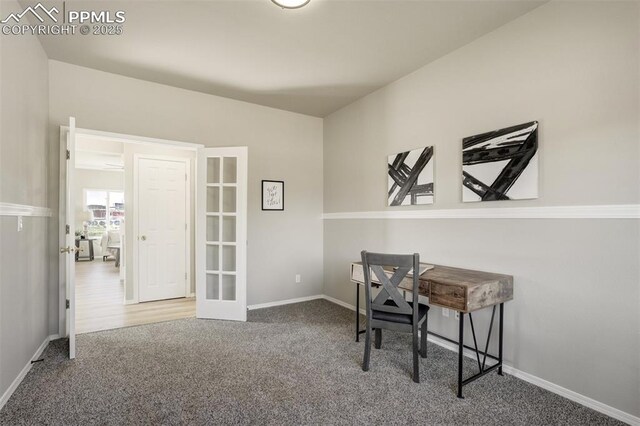 5717 Stable Ct, Colorado Springs, CO 80920 - carpeted home office featuring baseboards and french doors
