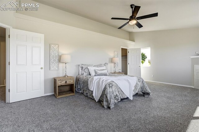 5717 Stable Ct, Colorado Springs, CO 80920 - carpeted bedroom featuring vaulted ceiling, baseboards, and a ceiling fan
