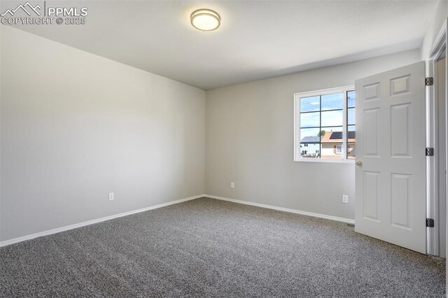 5717 Stable Ct, Colorado Springs, CO 80920 - carpeted spare room with baseboards