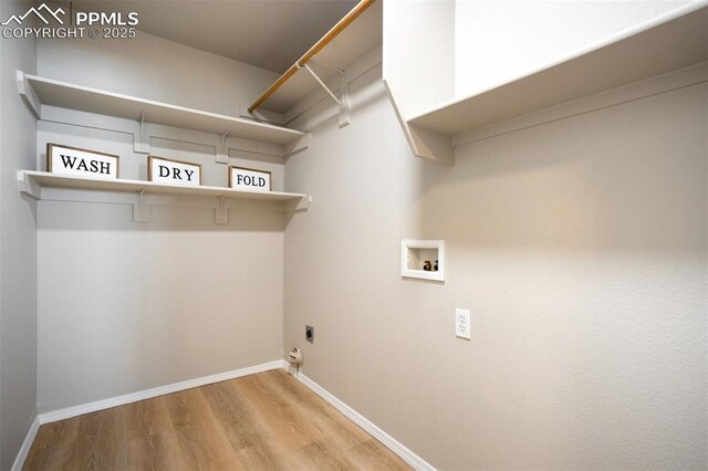 5717 Stable Ct, Colorado Springs, CO 80920 - washroom with hookup for a washing machine, wood finished floors, baseboards, and hookup for an electric dryer