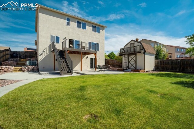 5717 Stable Ct, Colorado Springs, CO 80920 - back of house featuring a patio area, stairs, a deck, stucco siding, and cooling unit