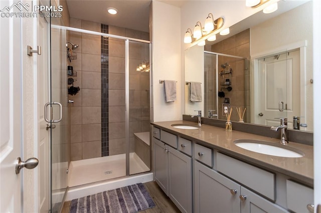 8162 Grey Bark Way, Colorado Springs, CO 80908 - bathroom with double vanity and a shower stall