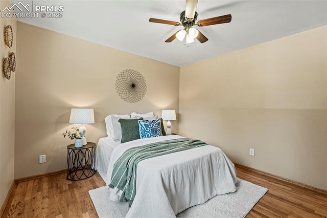 930 Bowser Dr, Colorado Springs, CO 80909 - bedroom featuring wood finished floors, baseboards, and ceiling fan
