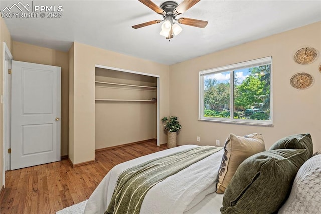 930 Bowser Dr, Colorado Springs, CO 80909 - bedroom with a closet, wood finished floors, baseboards, and a ceiling fan