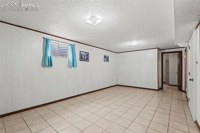 930 Bowser Dr, Colorado Springs, CO 80909 - below grade area with crown molding and a textured ceiling