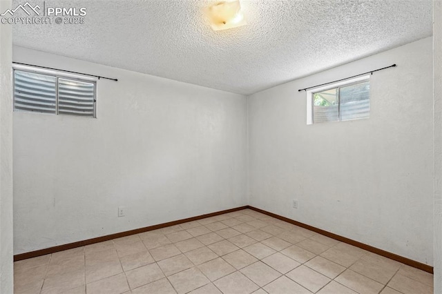 930 Bowser Dr, Colorado Springs, CO 80909 - unfurnished room with a textured ceiling