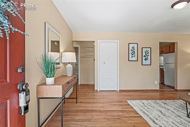 930 Bowser Dr, Colorado Springs, CO 80909 - entrance foyer featuring light wood-style flooring and baseboards
