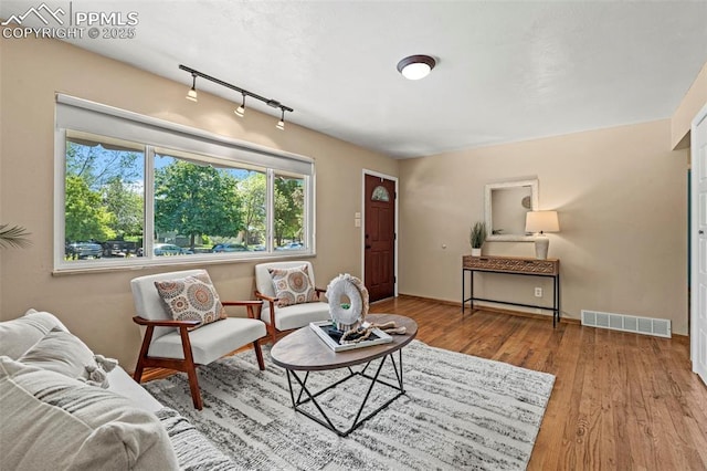 930 Bowser Dr, Colorado Springs, CO 80909 - living room with wood finished floors and baseboards