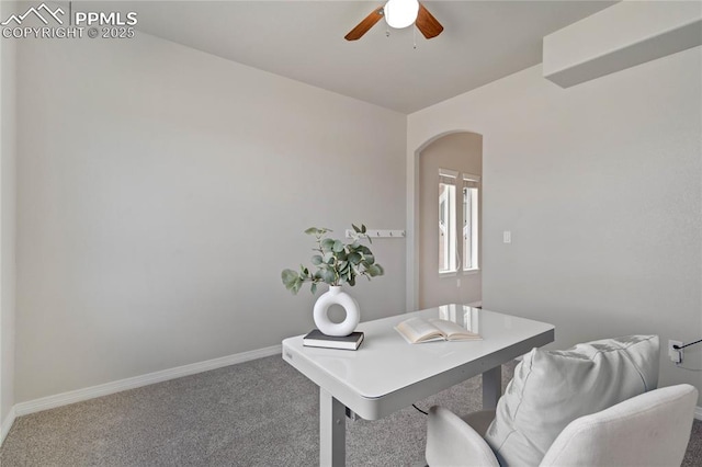 12529 Culebra Peak Dr, Peyton, CO 80831 - office space with baseboards, arched walkways, a ceiling fan, and carpet