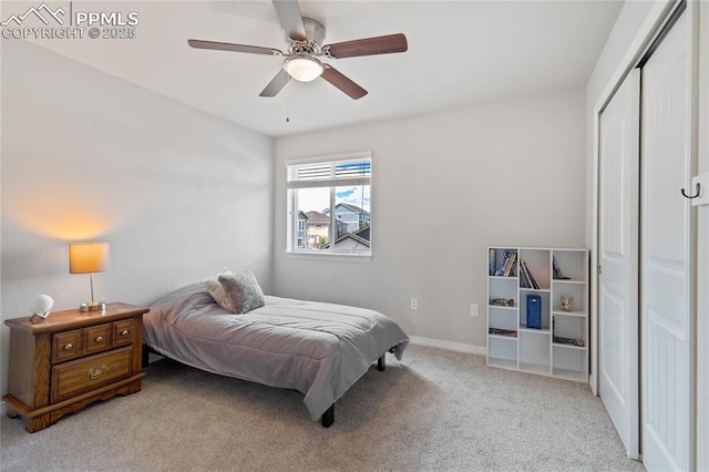 12529 Culebra Peak Dr, Peyton, CO 80831 - bedroom with baseboards, a closet, light colored carpet, and ceiling fan