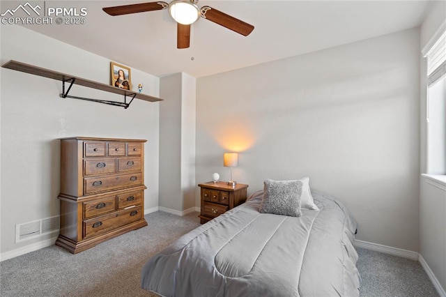 12529 Culebra Peak Dr, Peyton, CO 80831 - carpeted bedroom with baseboards, a ceiling fan, and visible vents