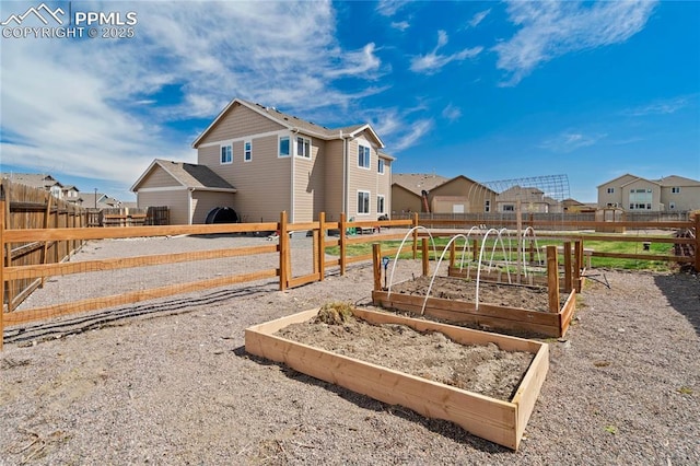 12529 Culebra Peak Dr, Peyton, CO 80831 - view of jungle gym featuring fence, a garden, and a residential view