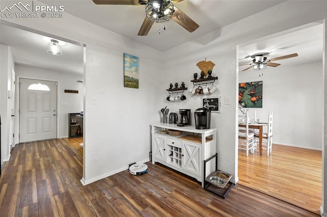 219 Fairfax St, Colorado Springs, CO 80911 - hallway with baseboards and dark wood-type flooring