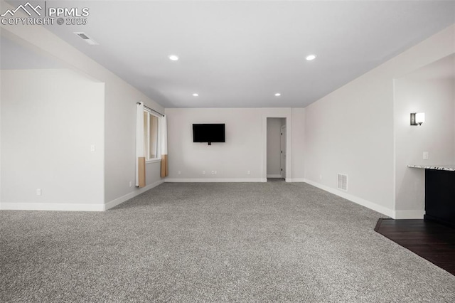 4225 New Santa Fe Trl, Colorado Springs, CO 80924 - unfurnished living room with carpet flooring, baseboards, and recessed lighting