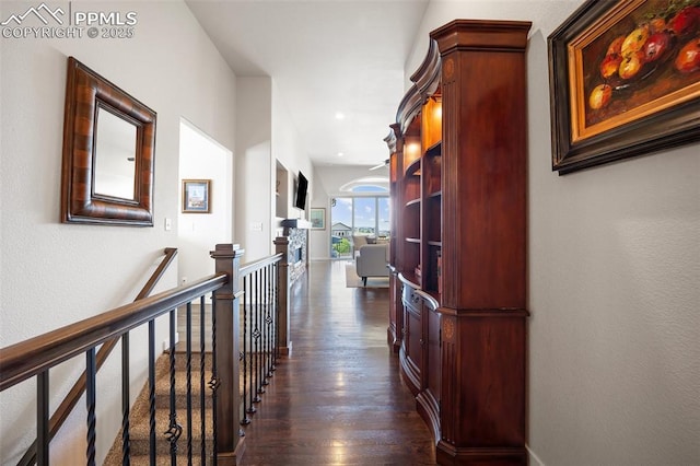 4225 New Santa Fe Trl, Colorado Springs, CO 80924 - hallway featuring dark wood finished floors and an upstairs landing