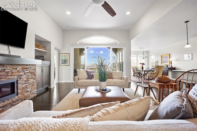 4225 New Santa Fe Trl, Colorado Springs, CO 80924 - living room with ceiling fan, plenty of natural light, a stone fireplace, wood finished floors, and recessed lighting