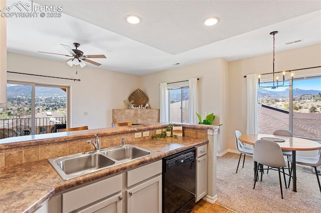 1530 Little Bear Creek Pt Unit 302, Colorado Springs, CO 80904 - kitchen featuring visible vents, a sink, black dishwasher, and a healthy amount of sunlight