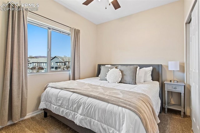 1530 Little Bear Creek Pt Unit 302, Colorado Springs, CO 80904 - bedroom with baseboards, a ceiling fan, and carpet flooring